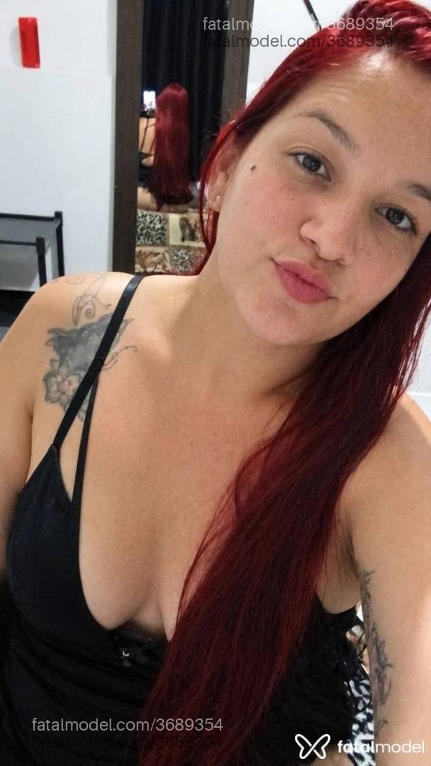 Acompanhante mulher ruiva (o) de olhos castanhos - Alexia