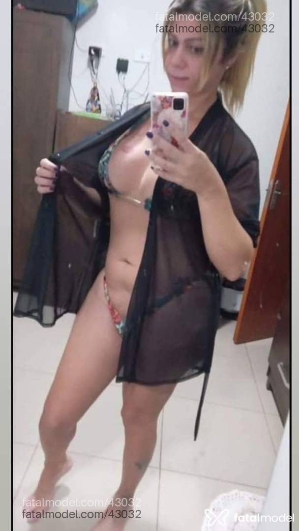 Acompanhante travesti loira (o) de olhos castanhos - Adriana