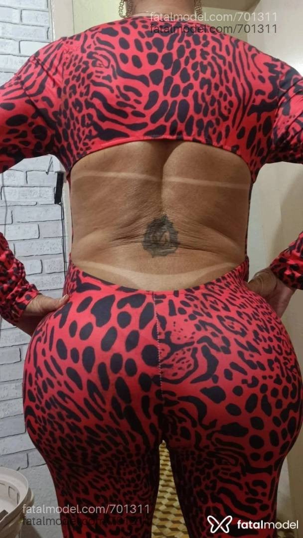 Acompanhante mulher trans com cabelo castanho de olhos castanhos - Doris Barbosa