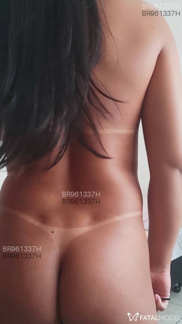 Acompanhante mulher trans com cabelo colorido de olhos castanhos em Bastos - Rafaela