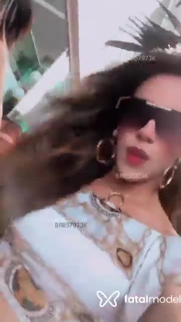 Acompanhante mulher trans com cabelo castanho de olhos castanhos em São Paulo - Gisele Gusmão