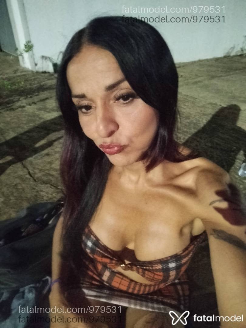 Acompanhante travesti com cabelo castanho de olhos castanhos - Fabiola Correia