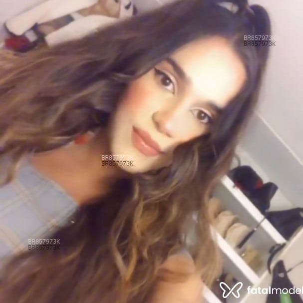 Acompanhante mulher trans com cabelo castanho de olhos castanhos em São Paulo - Gisele Gusmão